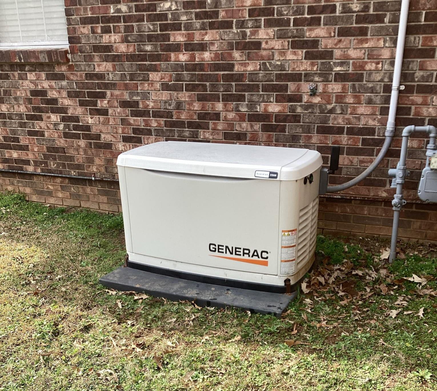 generator next to brick wall