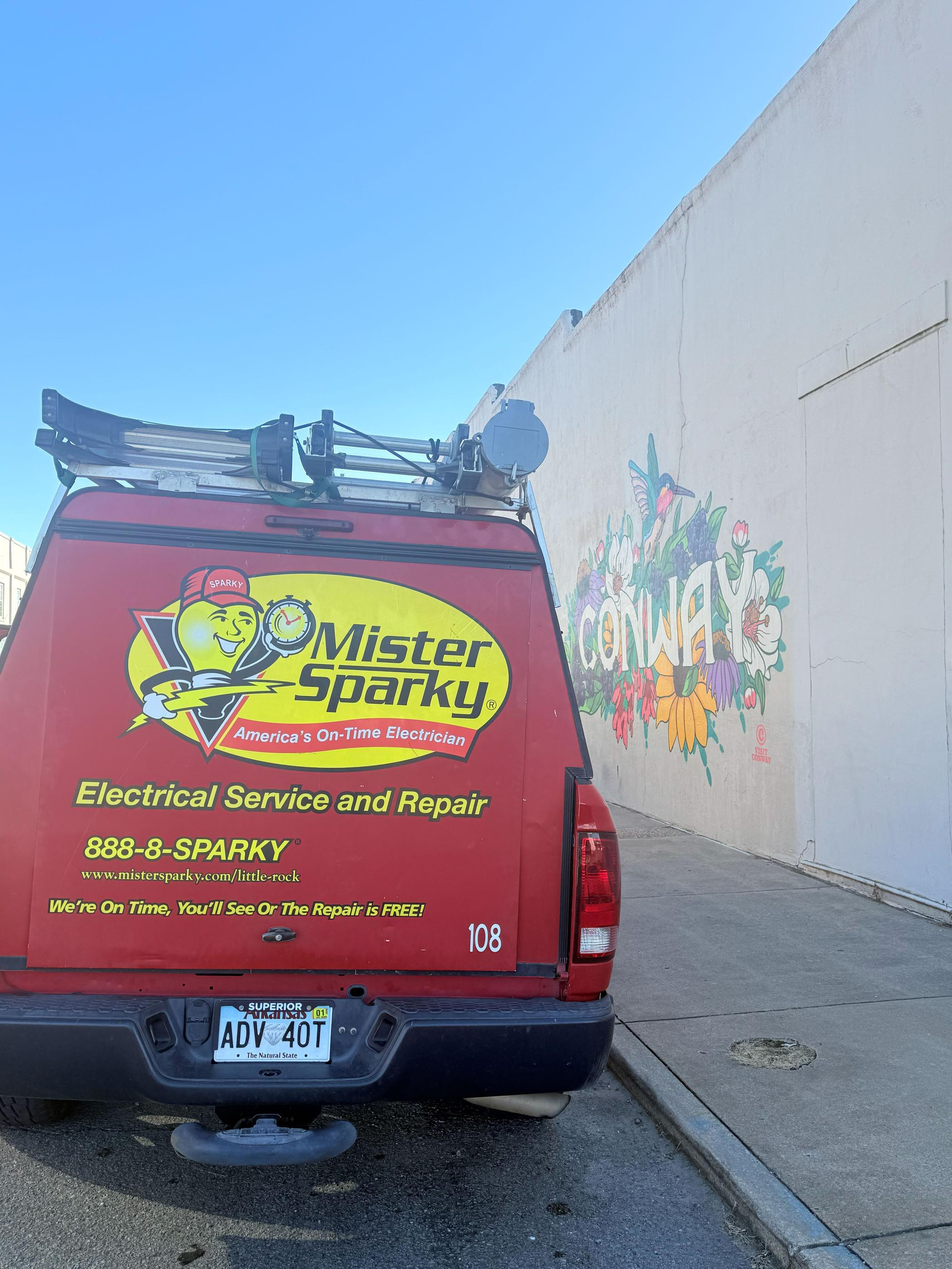 Red mister sparky van in Conway