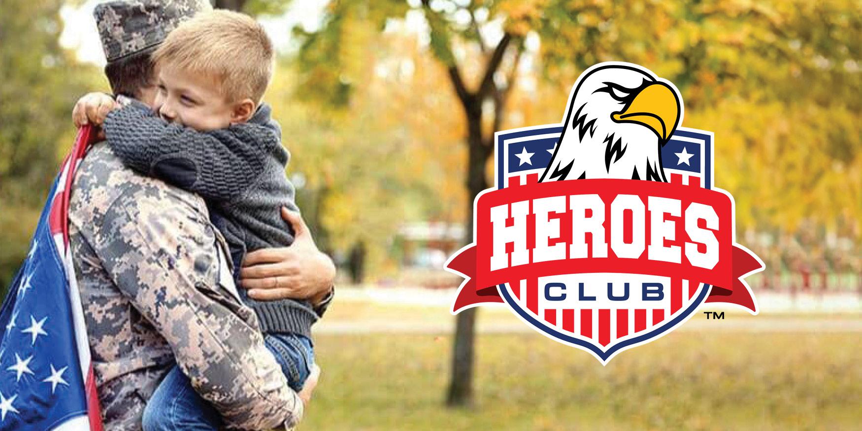 solider hugging child