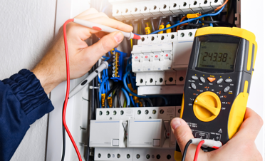 man conducting home electrical inspection